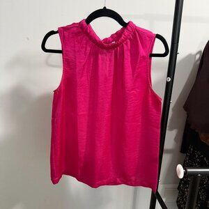 Hot pink sleeveless satin top.